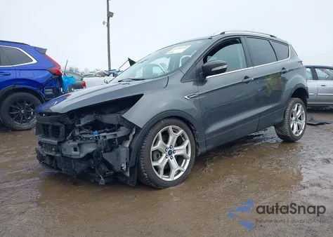 2019 Ford Escape Titanium z USA, uszkodzony, nr VIN 1FMCU9J91KUB74301